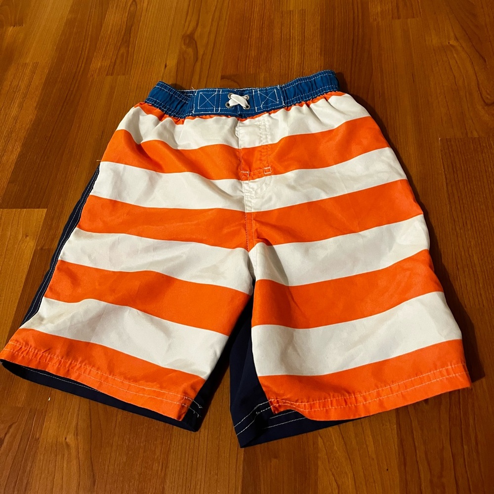 iXtreme Boys' small Swim Trunks/ Quick
Dry Board Shorts with Mesh Lining